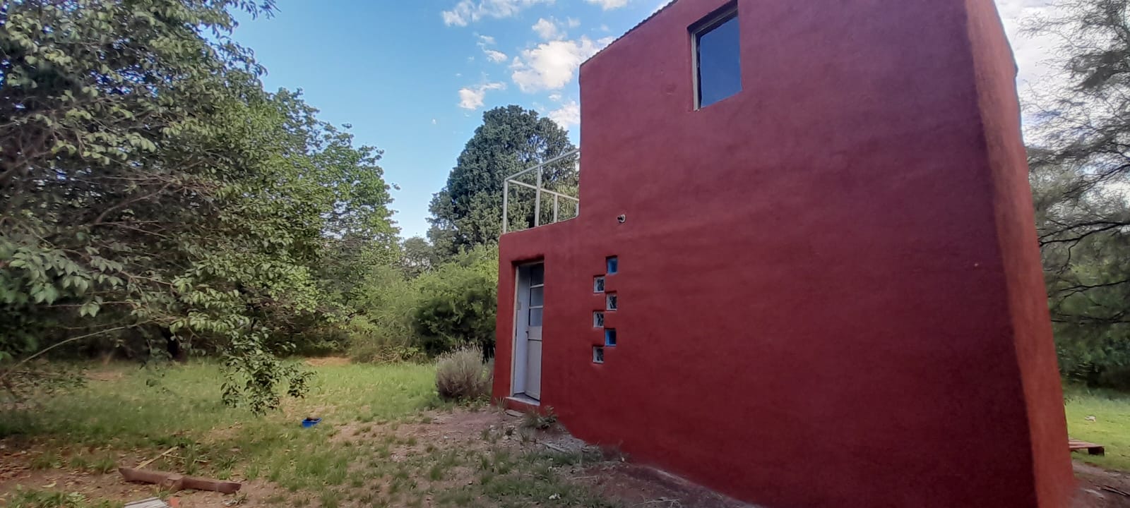 UNA CASA Y UNA CONSTRUCCION A TERMINAR EN MERLO | VENTA