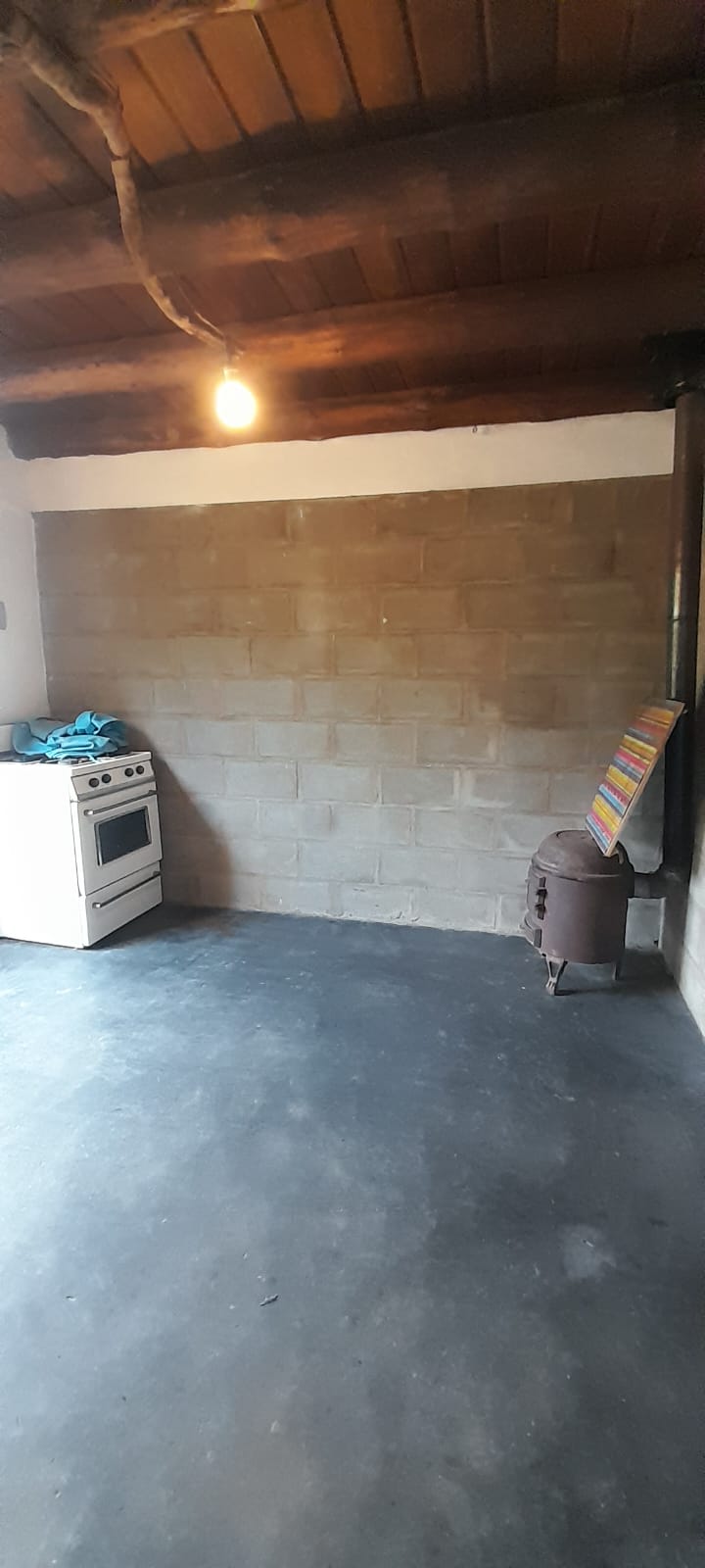 UNA CASA Y UNA CONSTRUCCION A TERMINAR EN MERLO | VENTA